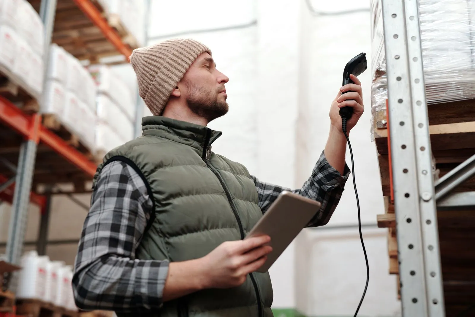 Warehouse associate scanning products for order fulfillment