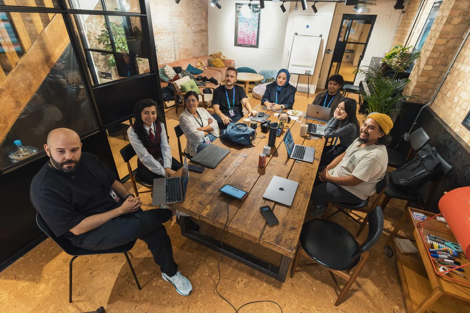 Diverse engineering team collaborating in a modern workspace