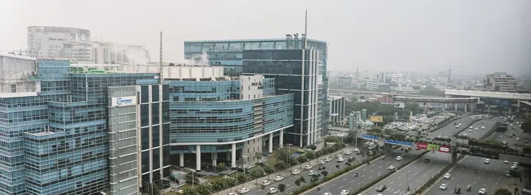 Glass office towers along the highway in Gurgaon Cyber City